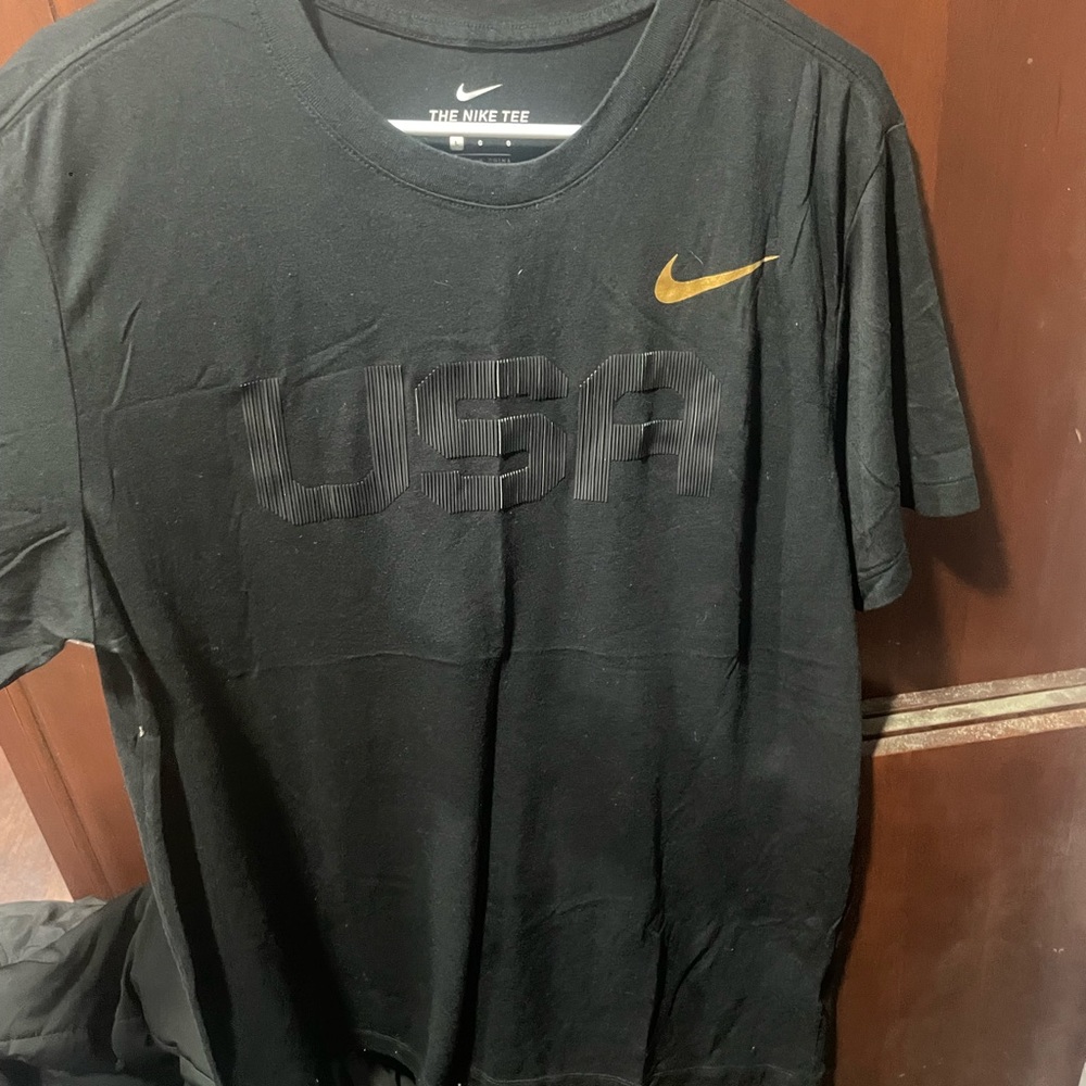Nike holographic Olympic gold dri-fit tee shirt.
